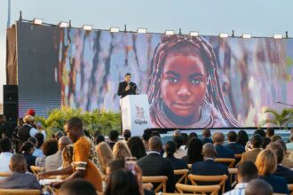 Angola’s tourism brand launch in Luanda, featuring a keynote speech before a large audience