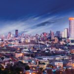 Evening skyline of Johannesburg, South Africa, showcasing the city’s financial district and urban landscape.