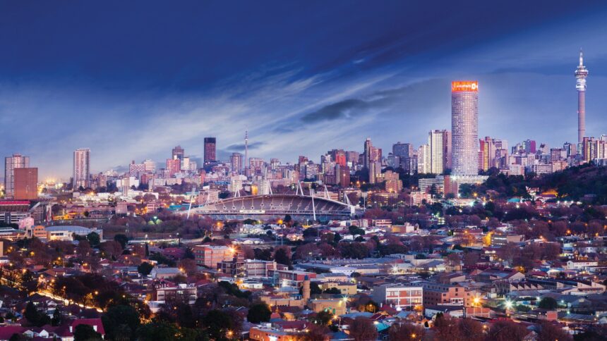 Evening skyline of Johannesburg, South Africa, showcasing the city’s financial district and urban landscape.