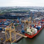 Cargo ships docked at the Port of Maputo, Mozambique.