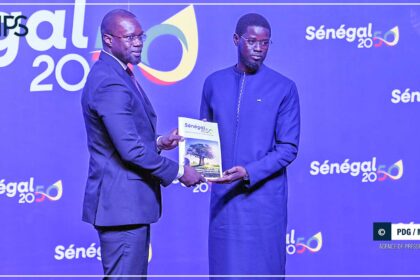 Officials present the Senegal 2050 development plan to the president at the Fii Senegal Investment Forum in Dakar