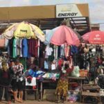 Shoppers browse racks of second-hand clothing at Lagos’s Katangua market, a major hub for used apparel.