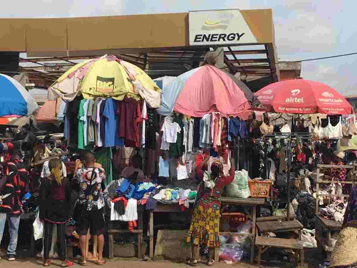 Shoppers browse racks of second-hand clothing at Lagos’s Katangua market, a major hub for used apparel.