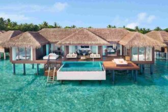 Guests receive a $150 resort credit per stay, plus daily dining and specialty restaurant perks.