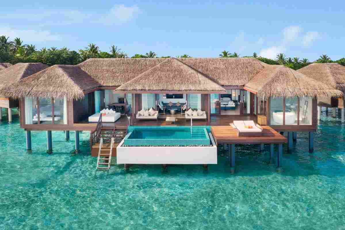 Guests receive a $150 resort credit per stay, plus daily dining and specialty restaurant perks.