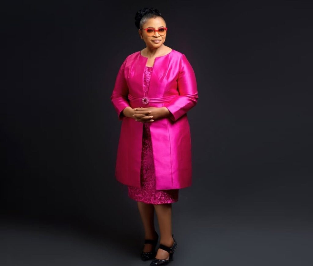Folorunso Alakija standing confidently as Nigeria’s richest woman.