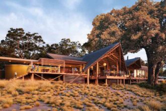 rewrite in 80 character: Newmark opens luxury Thitaka River Lodge in Namibia, expanding Africa safari tourism with eco-friendly design and premium travel experiences. Newmark opens Namibia luxury safari lodge, boosting eco tourism