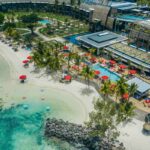 Aerial view of LUX Grand Baie in Mauritius, a flagship property of LUX Island Resorts under IBL Group’s luxury hospitality and tourism expansion strategy.