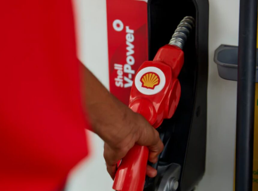 Shell logo on a fuel nozzle at a retail station.