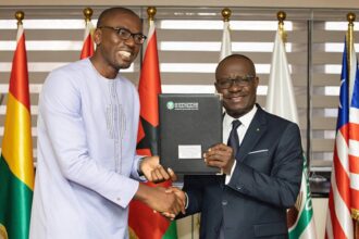 Afriland CEO Christian kammogne fogaing & George Agyekum Donkor EBID chair