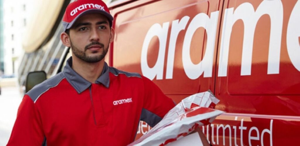 Aramex delivery worker handling parcel distribution for logistics operations.