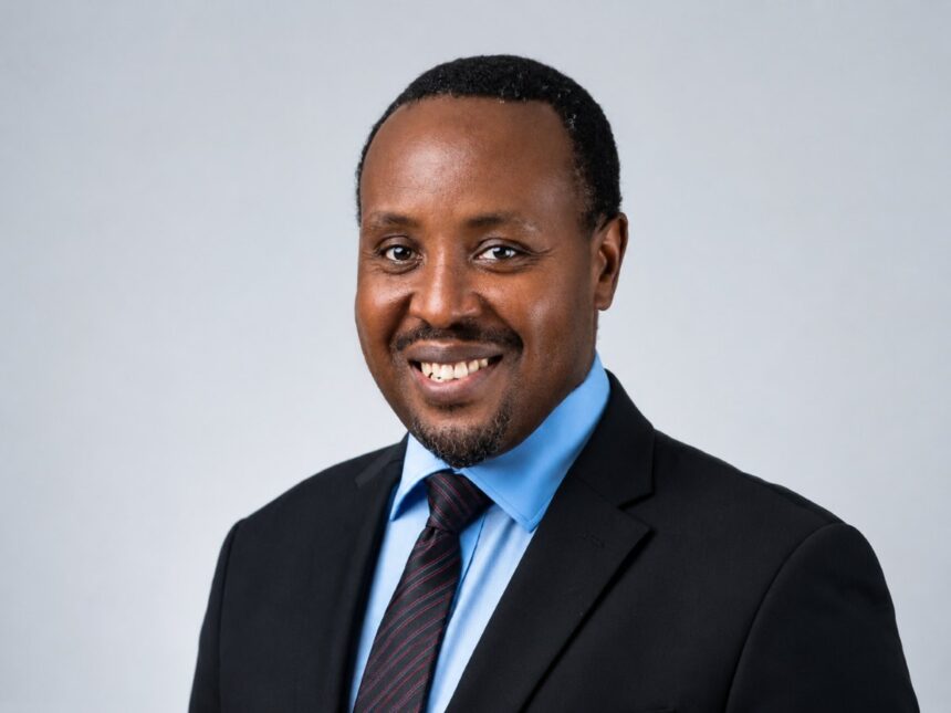 Allan Kilavuka, immediate former Group Managing Director and CEO of Kenya Airways, in an official executive portrait.