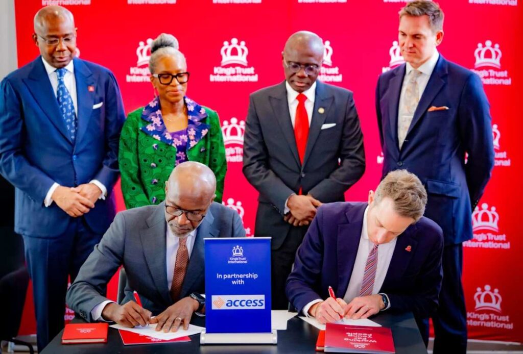 Roosevelt Ogbonna of Access Bank Plc and Will Straw of King’s Trust International during a recent signing ceremony.