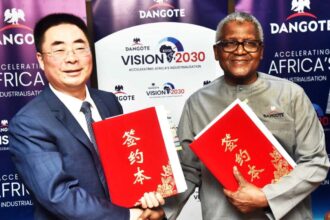 Aliko Dangote and Sinoma Chairman Lin Zhong.