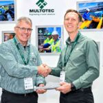 Thomas Holtz hands over the Multotec CEO role to Johan Robbertse at Electra Mining Africa 2026.